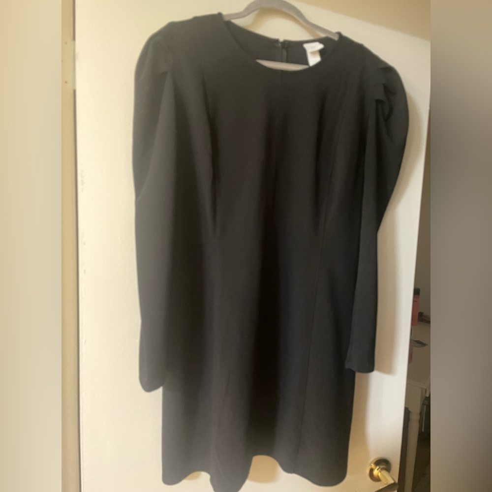 Black dress with puff sleeve and flattering silhouette